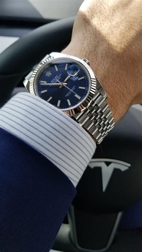 blue dial rolex with suit